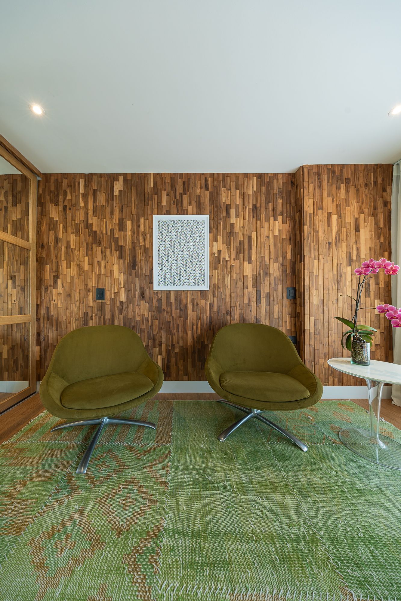 Dark profile teak wall in a sitting room