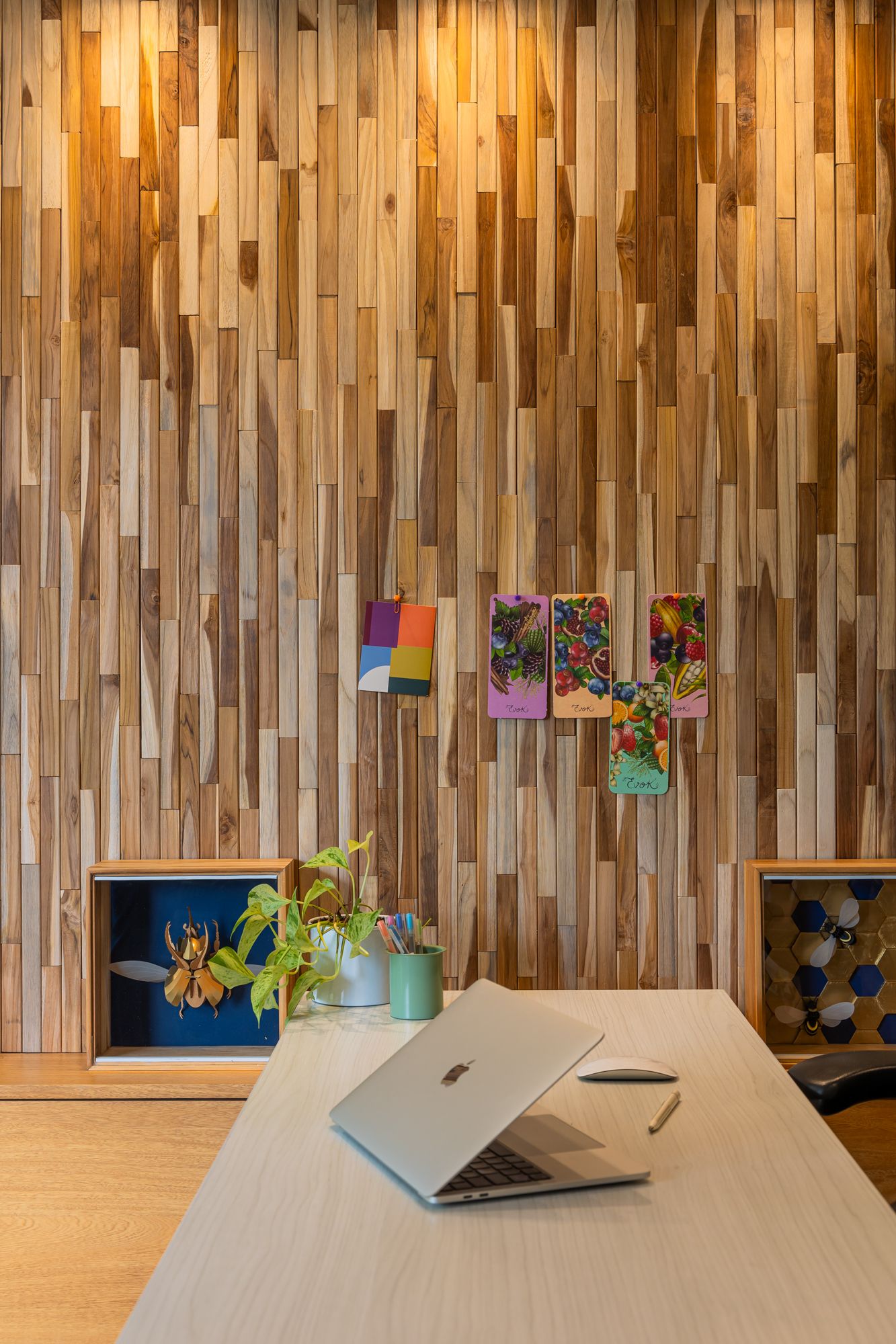 Light profile teak wall in a home office